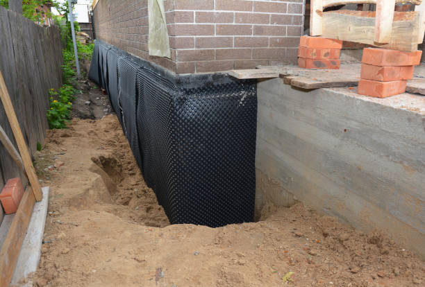 SJ Waterproofing Pros technician performing targeted Foundation Crack Repair assessment in Strongsville, OH